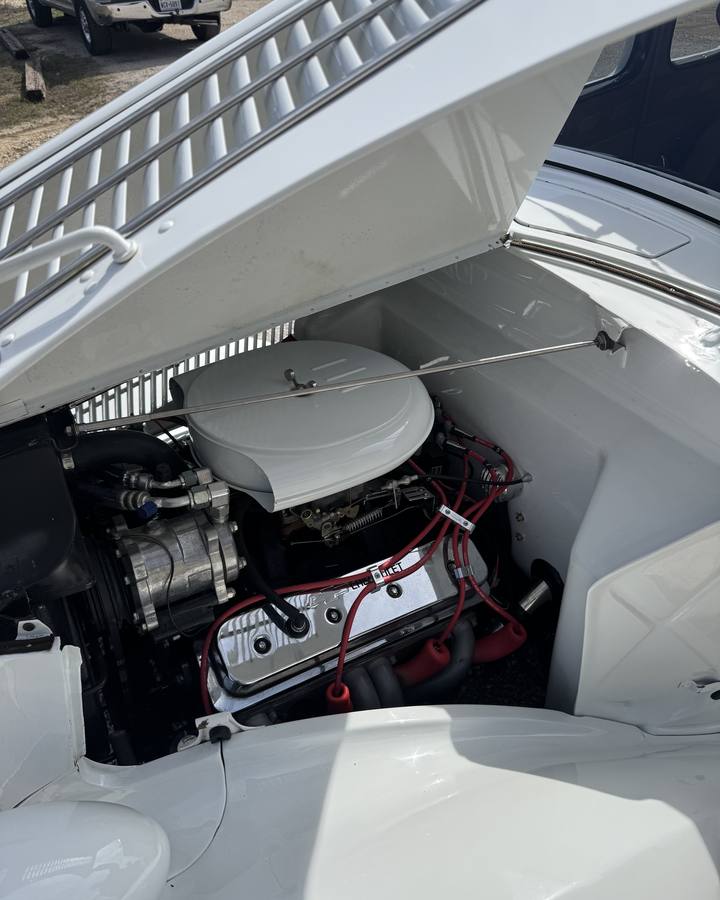 Detailed engine bay of a 1936 Ford coupe