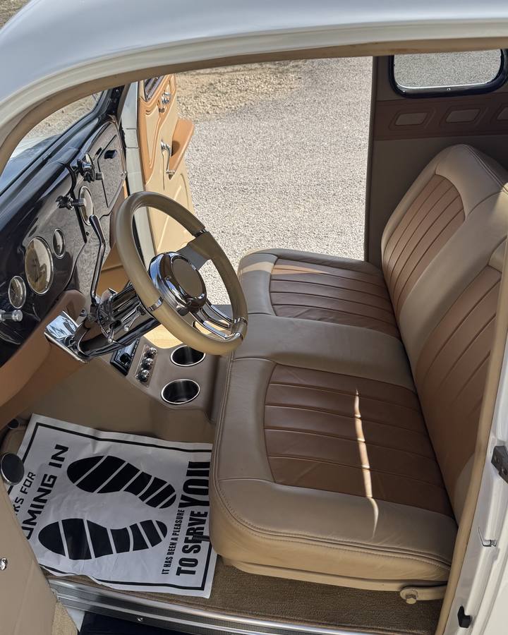 Tan leather interior of a 1936 Ford coupe