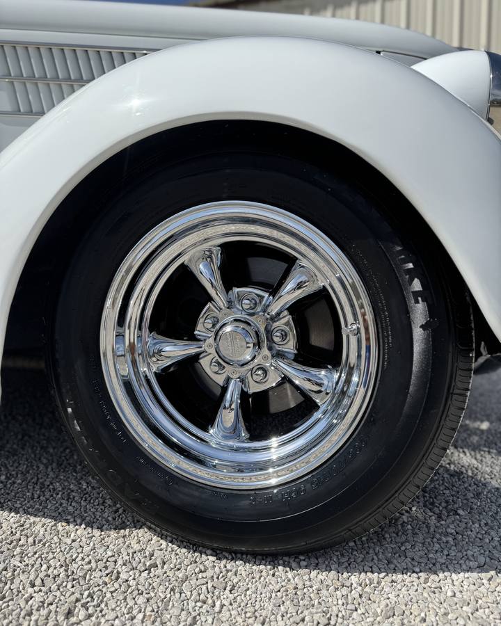 Polished wheel and chrome on a 1936 Ford