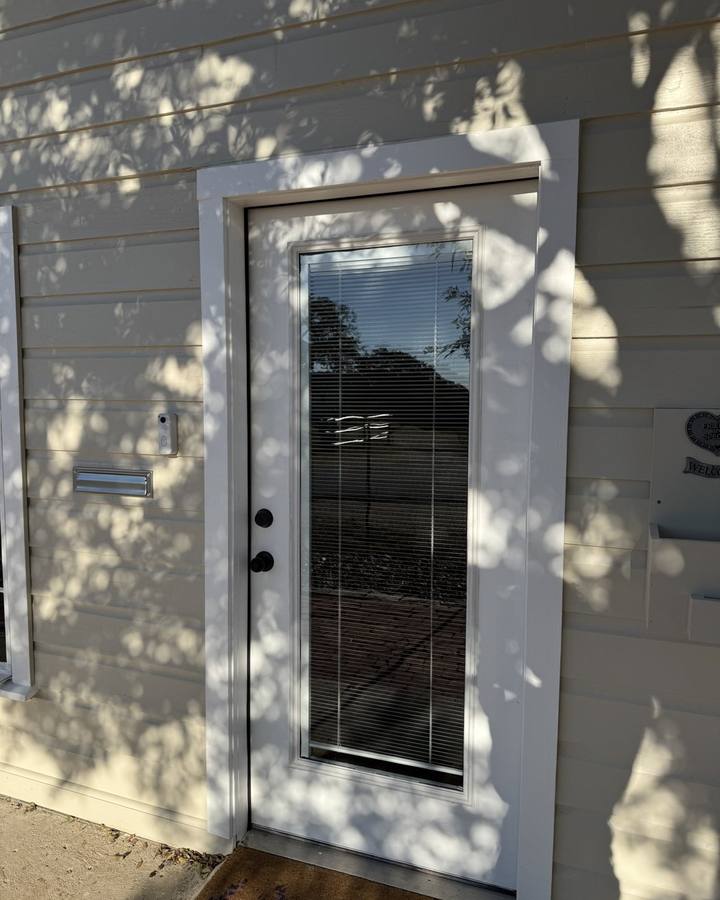 Tinted glass in a residential entry door