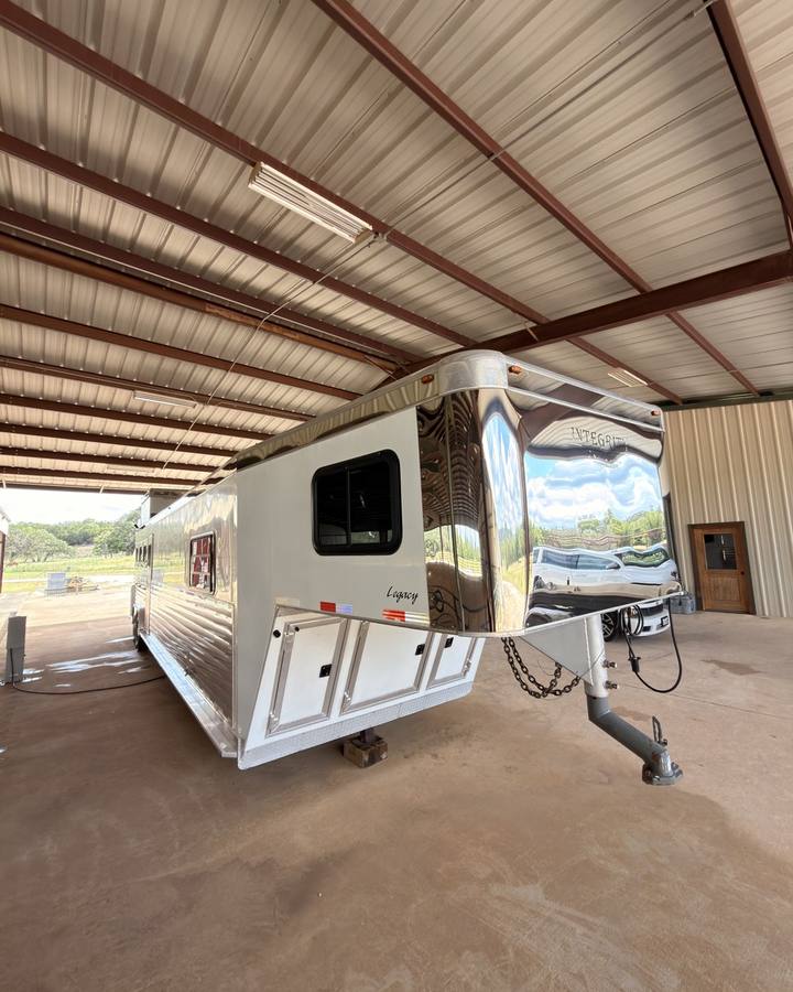 Polished aluminum horse trailer in the shop
