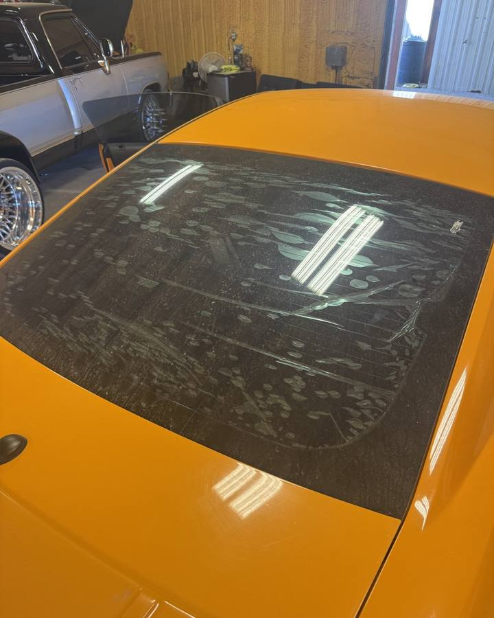 Camaro rear glass with bubbled old tint