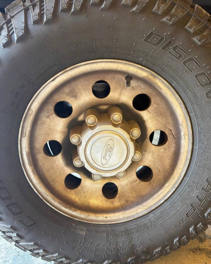 Polished Ford truck wheel before detailing